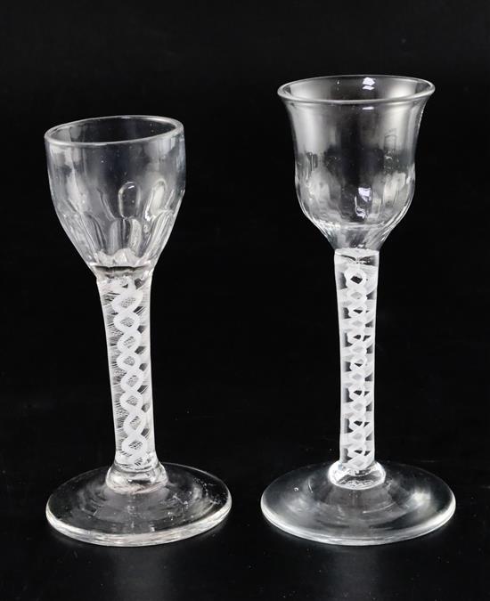 Two double series opaque twist stem cordial glasses, c.1760, H. 13.5 and 15cm